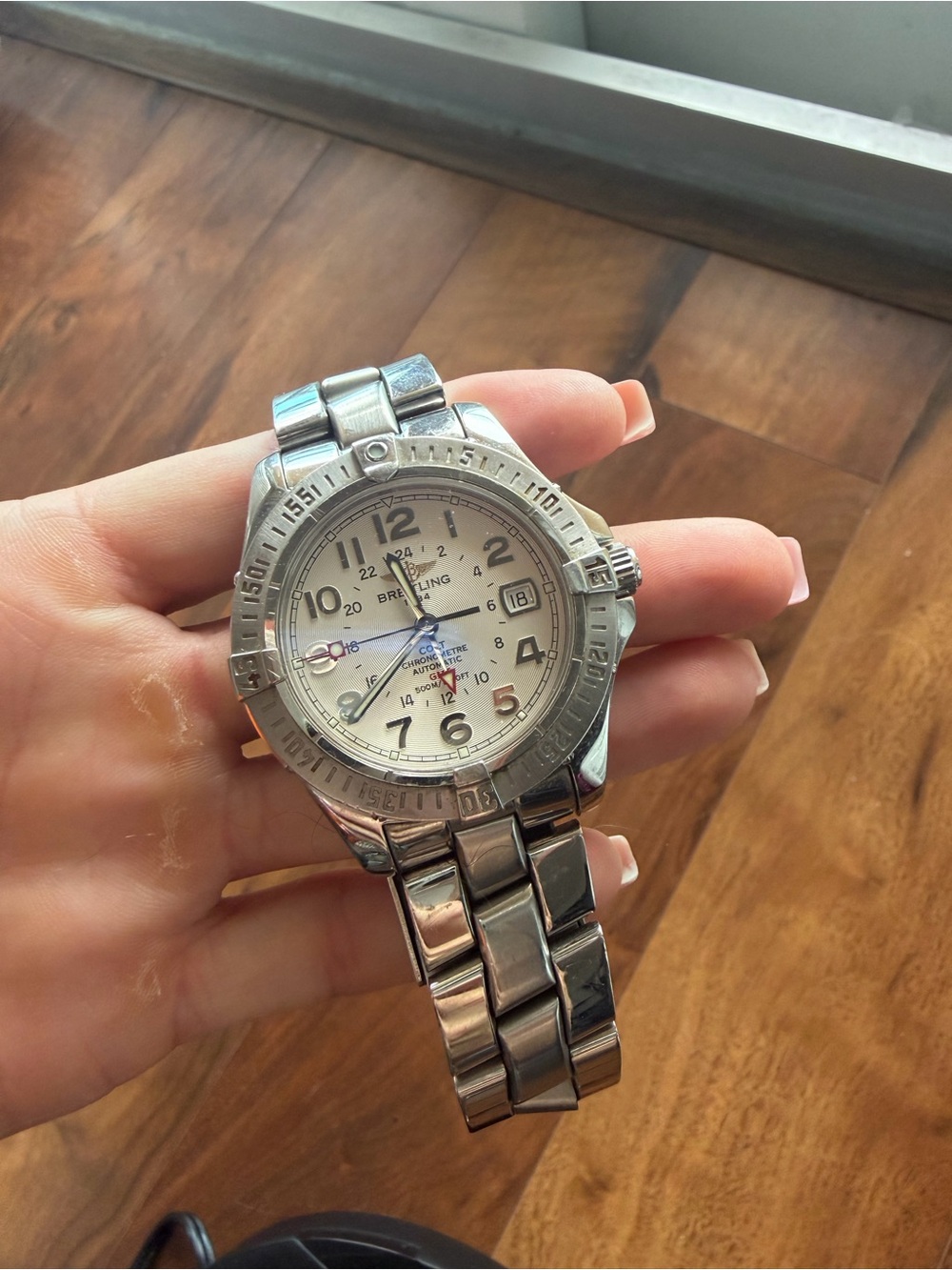 Breitling Silver Watch with White Dial